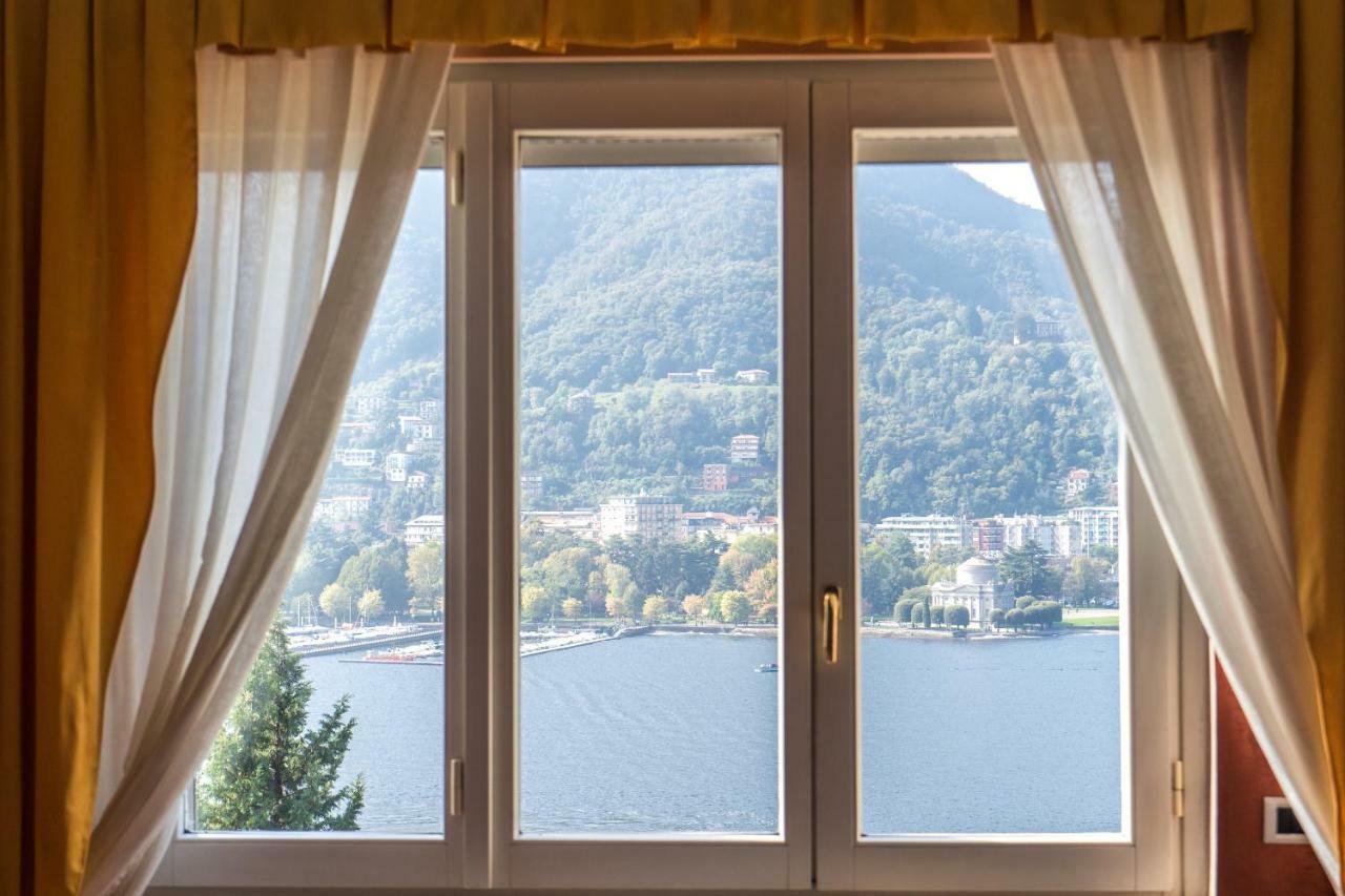 Lo Specchio Sul Lago - The House Of Travelers كومو المظهر الخارجي الصورة